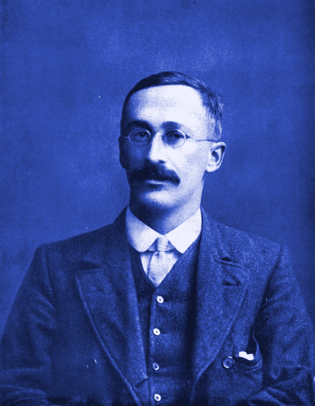 Portrait of William Sealy Gosset, who published the t-test as “Student”, rendered in navy duotone